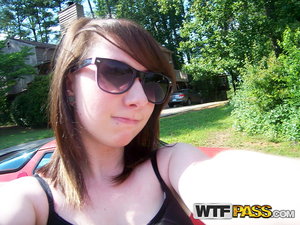 18 year old girl Katie Lewis stands naked after undressing in her bedroom